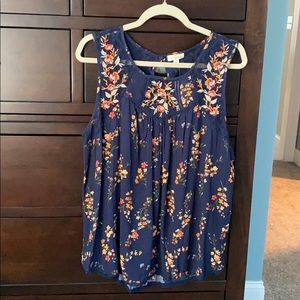 Never worn sleeveless blouse with lace detail.